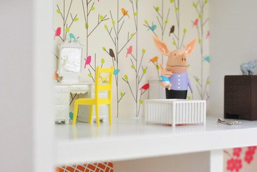 Close Up Of Pig Dolls In Nursery Room In Hands-on Dollhouse Build