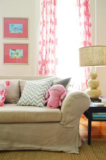 Glad and Bright Farmhouse Living Room With Pink Curtains