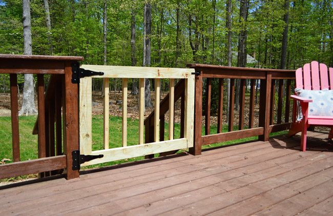 Wrapped up Hands-on Deck Gate Brought in To Fence With Raw Wood Pressure Treated Pine