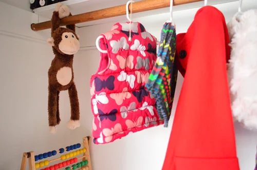 A Kids Closet Alongside Some Play Space In It