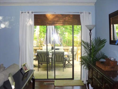Hanging Curtains On A Sliding Door: a house log