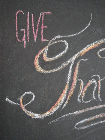 Close up of Give Thanks chalk lettering on Hands-on magnetic chalkboard