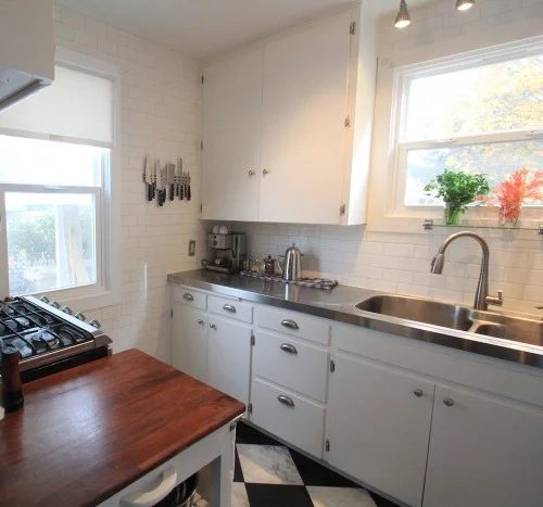 Adding Stainless Steel Counters To The Kitchen: a house log