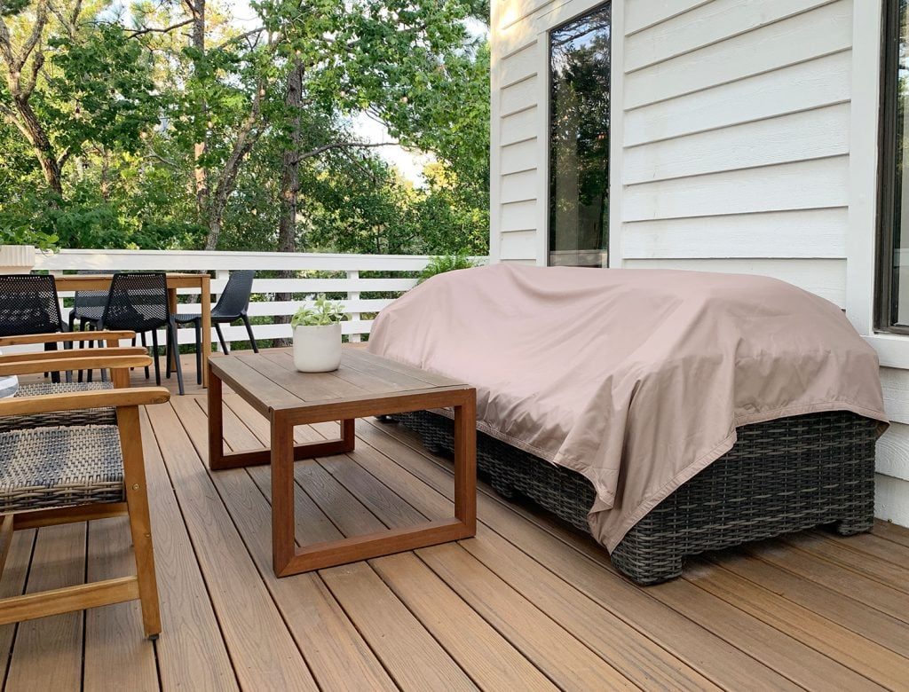 Sun Shade Used As Waterproof Cover Over Outdoor Sofa