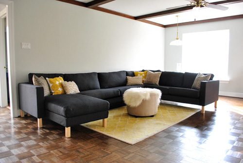 Ikea sectional sofa lately assembled in gray living room