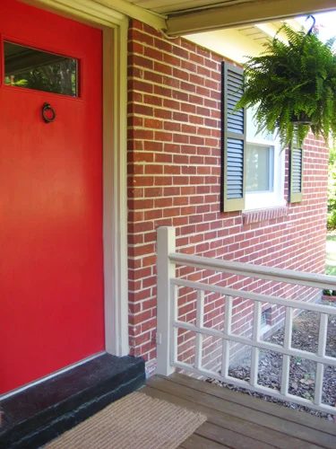 Hanging Ferns On The Front Porch: a house log