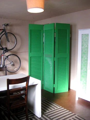 Making Bifold Doors Into A Screen To Hide A Water Heater: a house log