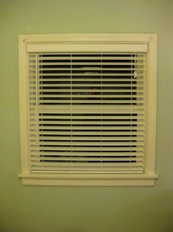 Hanging Some White Faux Wood Blinds In The Bedroom: a house log