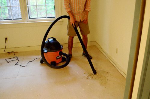 using shopvac to suck up carpet removal debris