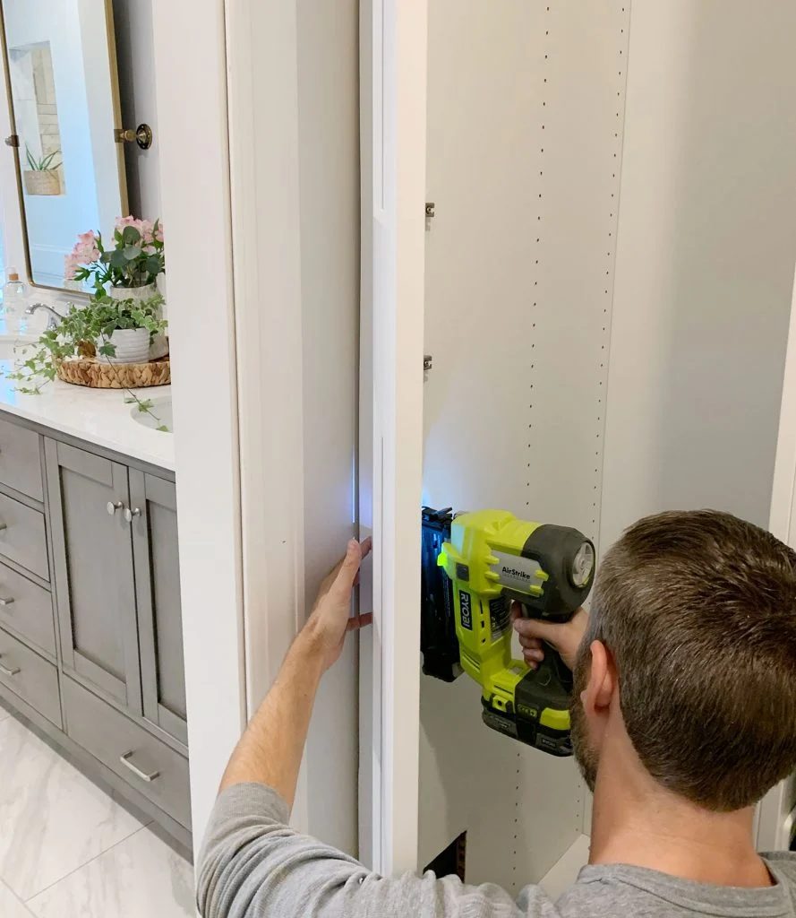 John Nailing Side Of Ikea Pax Wardrobe To Look Built In