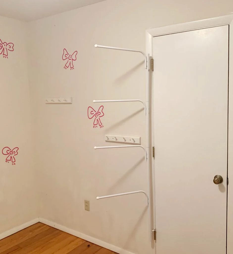 Before photo of boys room closet with laundry hanging rack