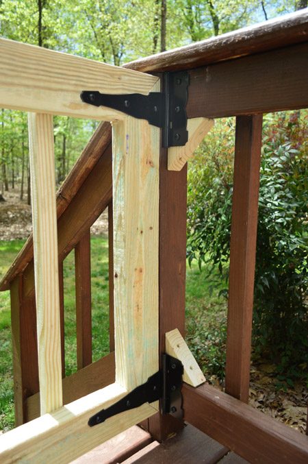 Blocks Of Scrap Wood Brought in To Railing To Give Secure Place to Add Hinges