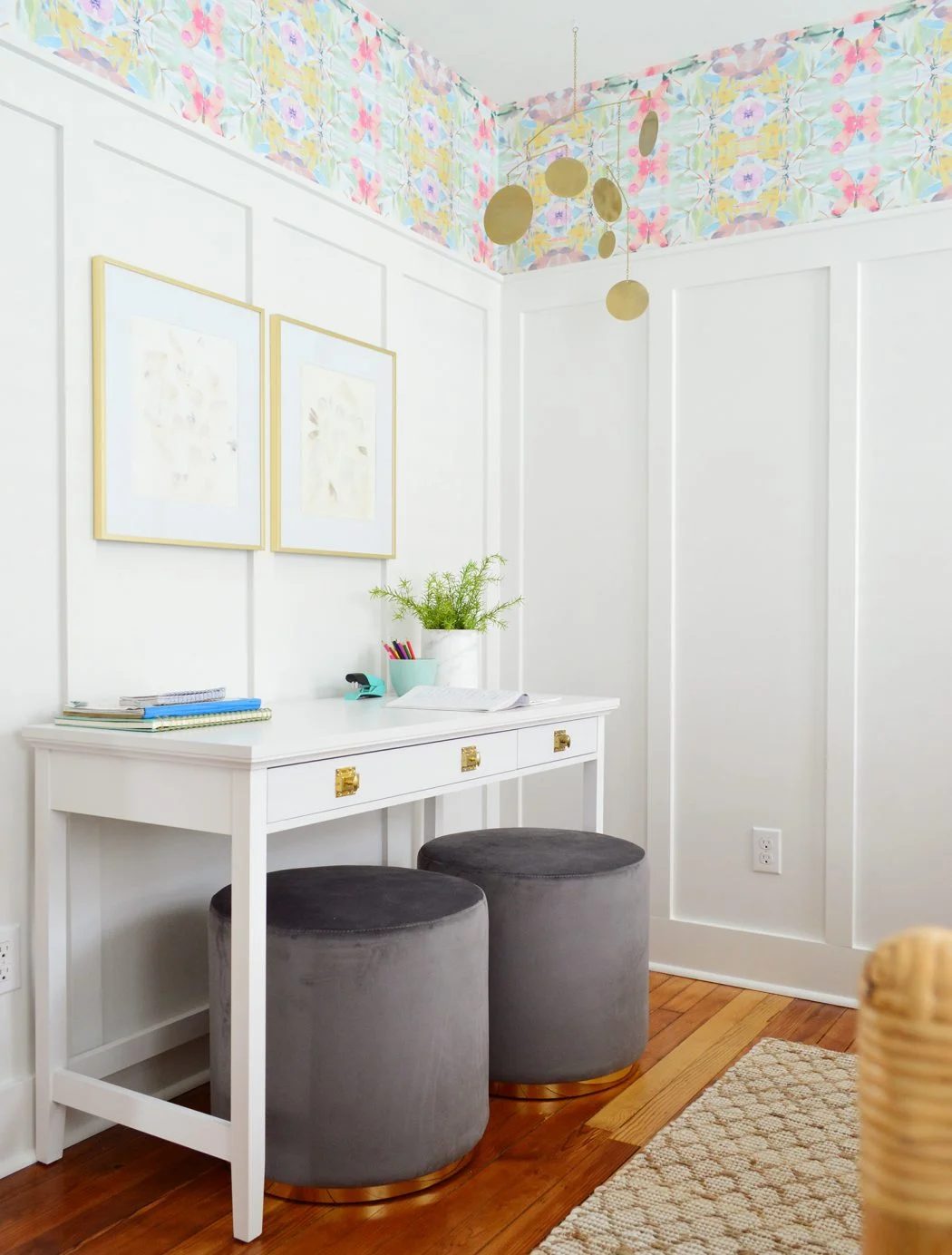 White Writing Desk Against White Board And Batten With Pouf Ottoman Seats