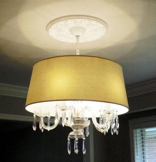 Making A Chandelier More Modern By Adding A Shade: a house log