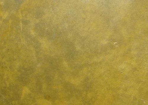 close-up detail of stained concrete floor in Tuscan Gold color by Behr Semi-Transparent Concrete Stain