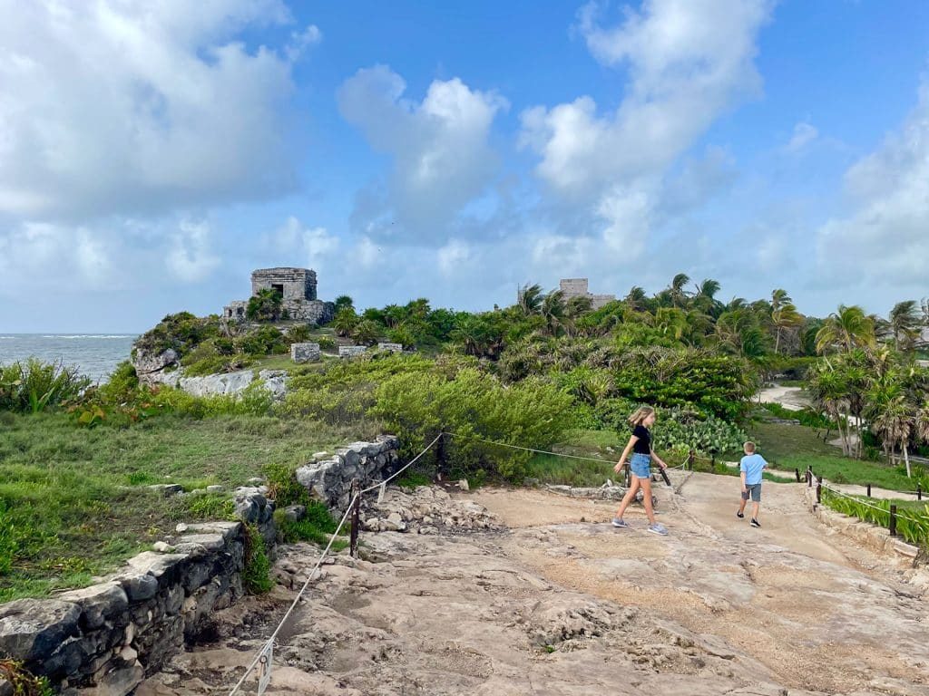 Kids Walking At Tulum Ruins In Mexico