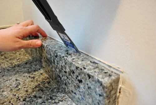 Removing The Side Splash & Backsplash From The Bathroom Sink