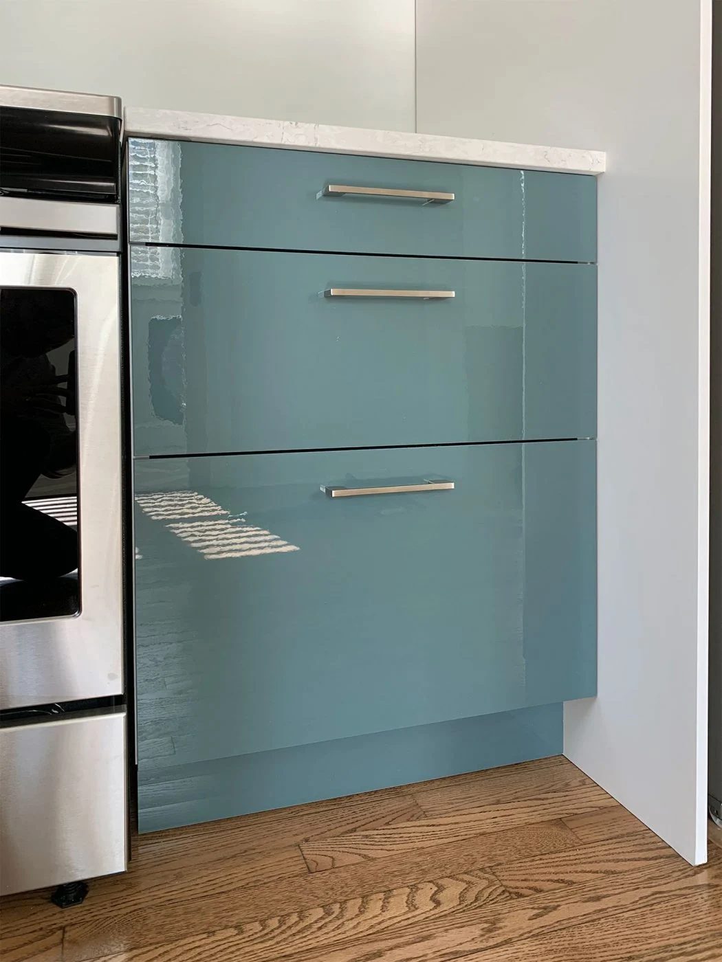 Wrapped up Ikea Cabinets With Brushed Nickel Hardware Installed