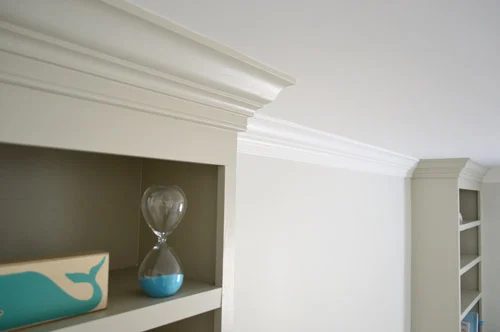 Adding Crown Molding Around Built-In Bookcases: a house log