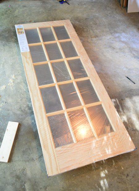 Unfinished 15 Pane Wood Door In Plastic Wrap For Bonus Room Entrance