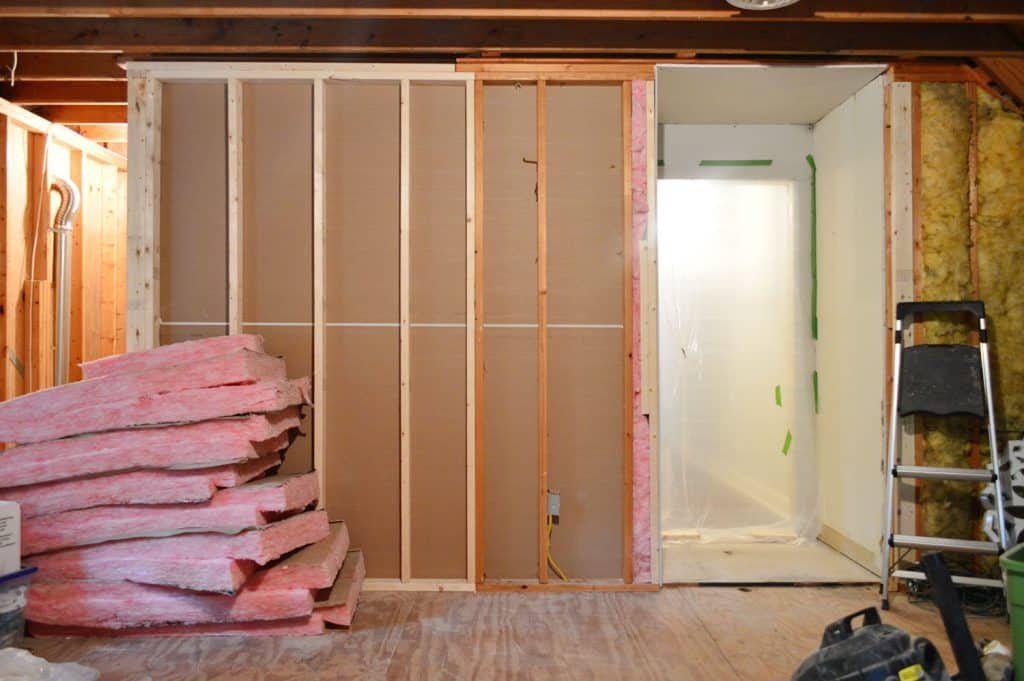 after photo of backside of laundry room with drywall completed on inside
