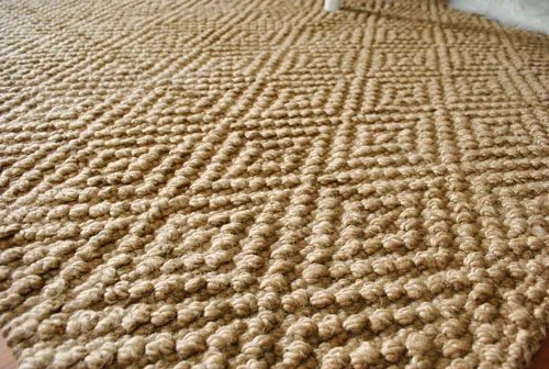 A Large Jute Rug Meant for The Bedroom