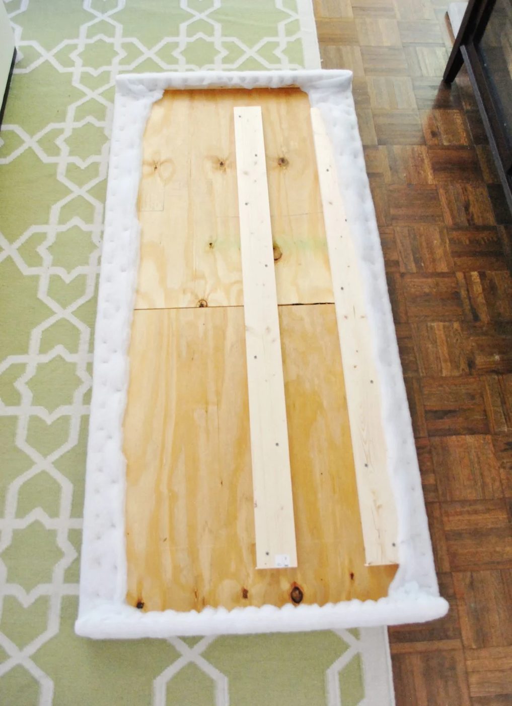 Second layer of batting stapled to back of Hands-on headboard frame