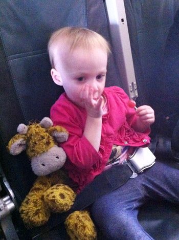 flying with toddler lollipop eating to assist with ear popping