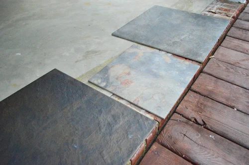 Deciding Between Painting Or Tiling A Concrete Floor: a house log