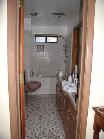 Using A Wire Basket To Store Toilet Paper: a house log