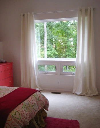 Hang Curtains So The Window Looks Bigger, step by step