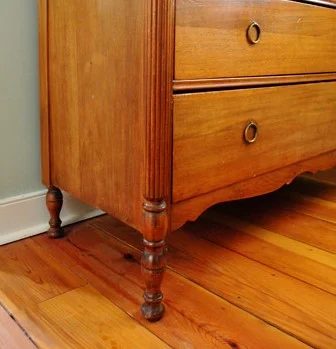 An Antique Wood Dresser: a house log
