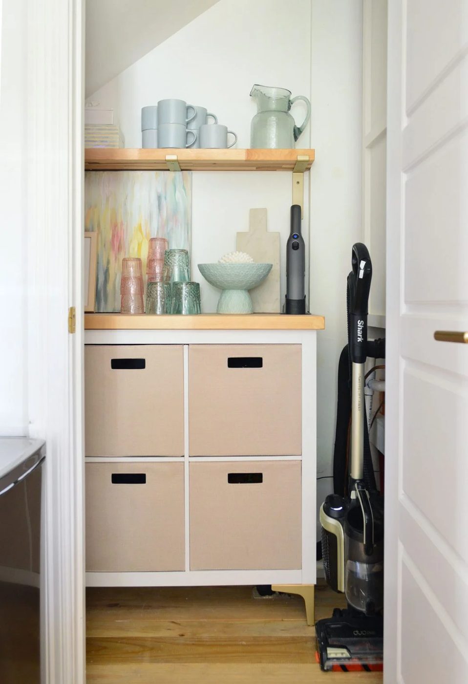 After Photo Of Utility Closet With Fairly Cubby Storage And Butcher Counter