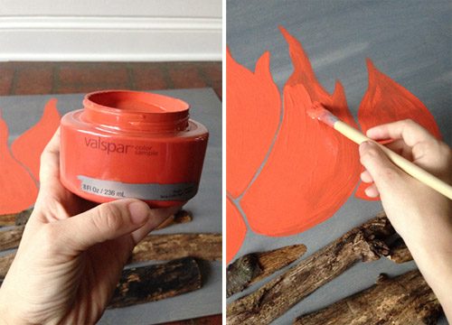 Sherry painting fake flames on Hands-on faux holiday fireplace