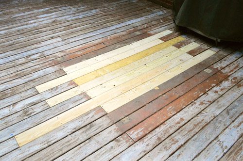 Patched hole in wooden deck
