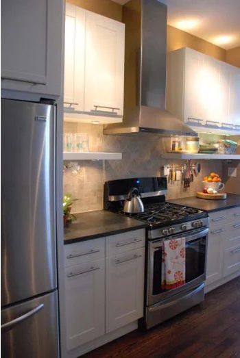 A White Kitchen With Black Counters & Open Shelves