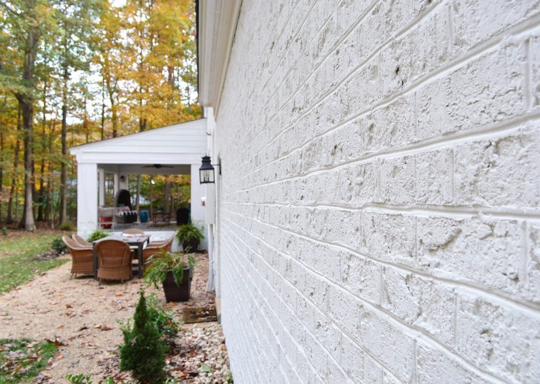 Detail Picture Of Brick Texture On Painted White Home