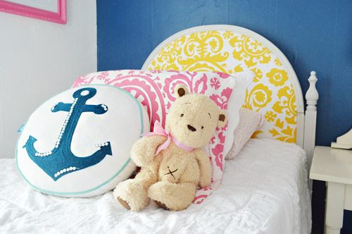 Blue Pink And Yellow Bright Pillows In Kids Room