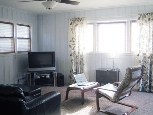 Brightening A Dark Room Alongside Paint And A Beachy Color Palette