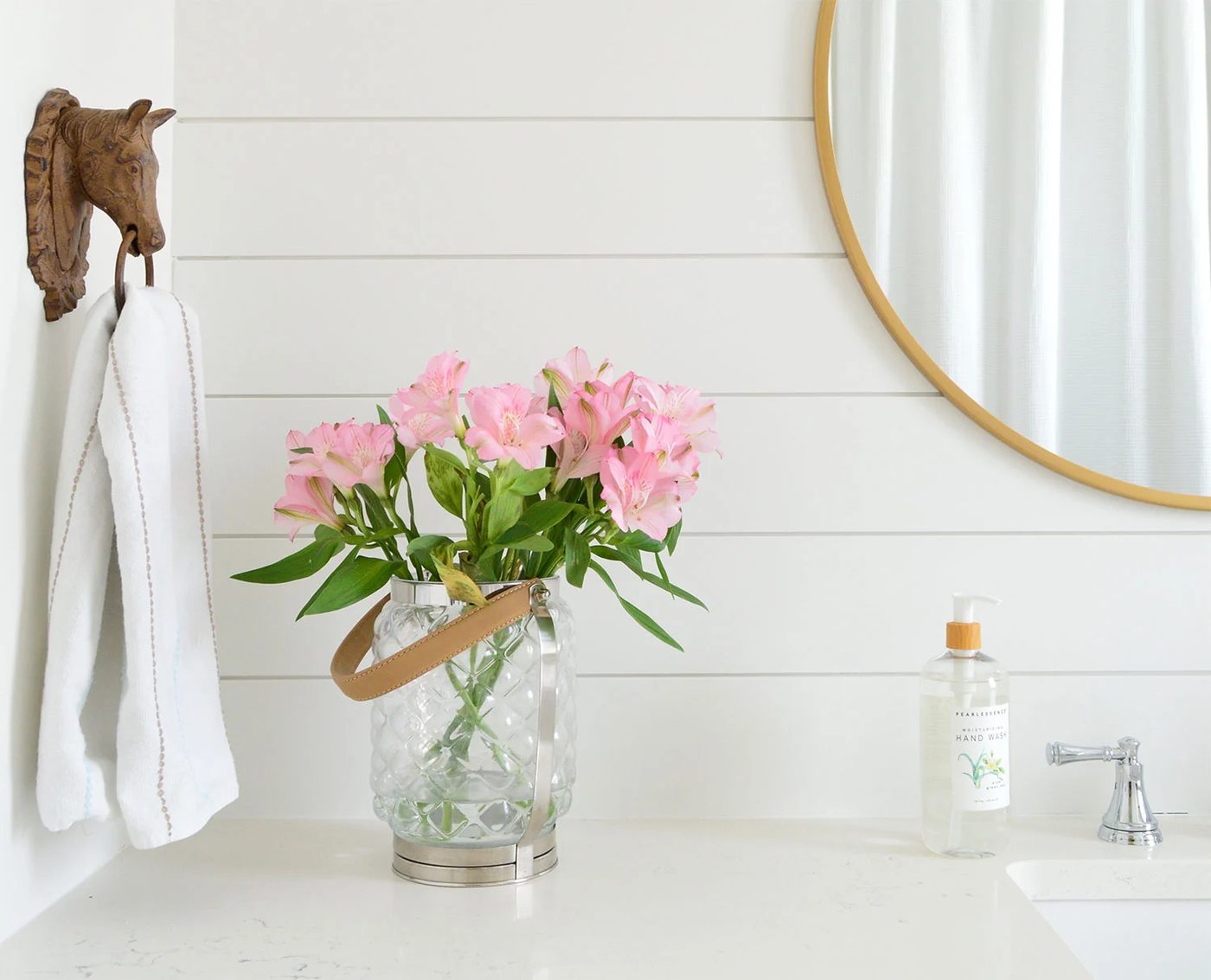 Shiplap Wall In Bathroom Painted Extra White With Round Gold Mirror Flowers