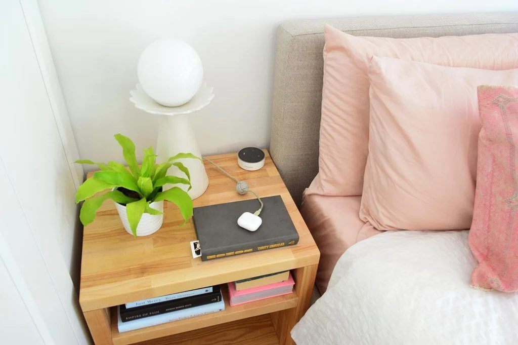 View Of Top Of Butcher Block Hands-on Nightstand With Modern Lamp