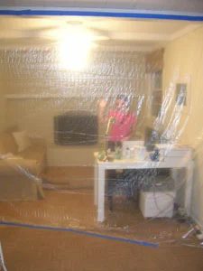 Using Plastic Tarps During Renovation To Keep Dust Out: a house log