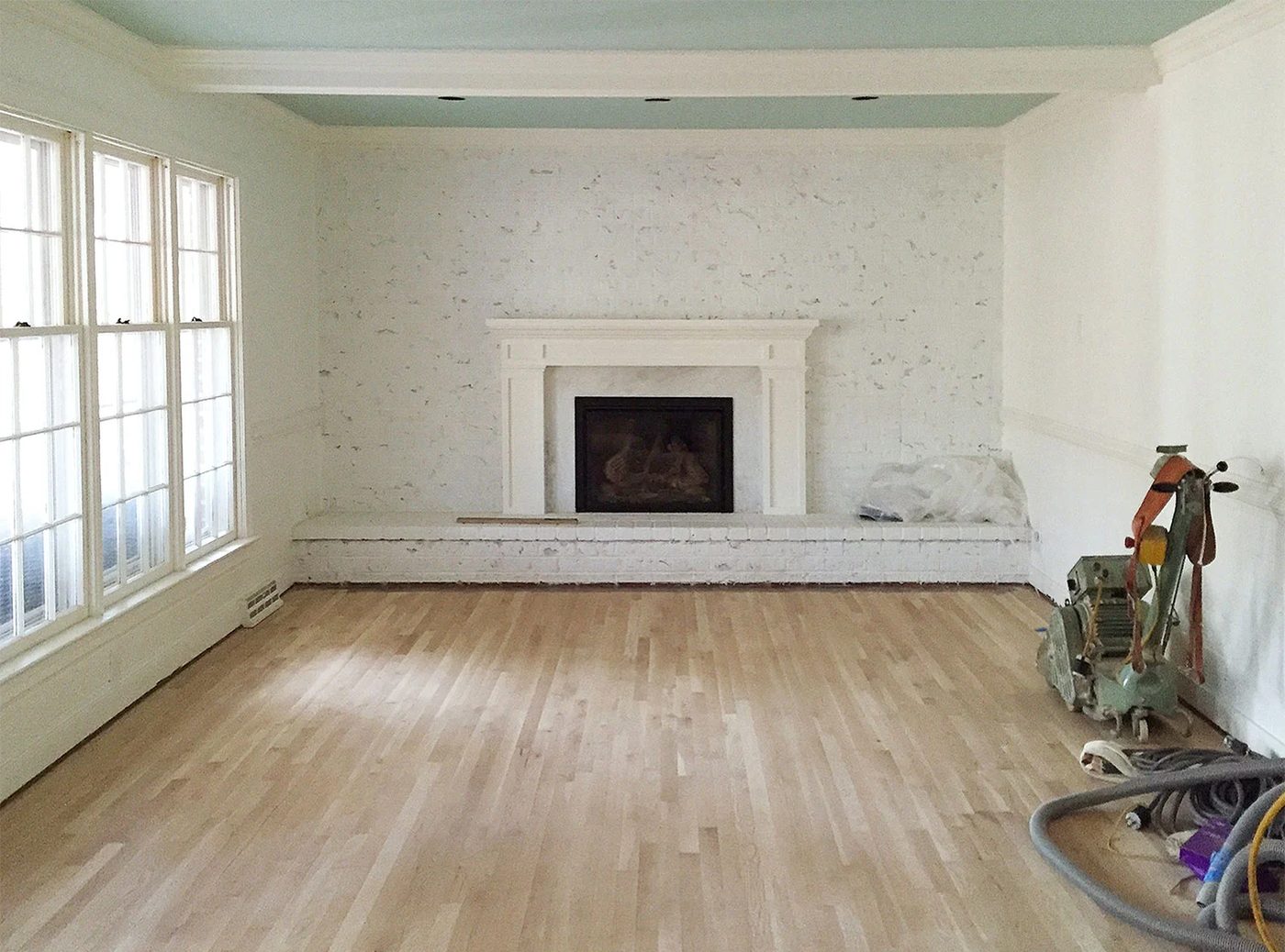 Refinishing Hardwood Floors 101: a house log