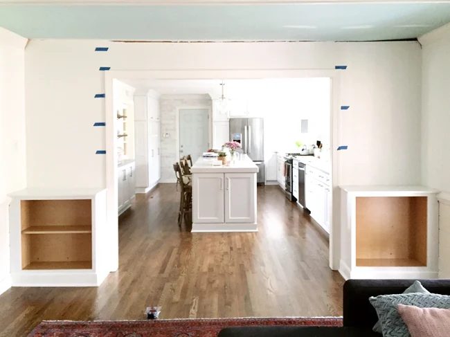 Painters Tape On Wall To Determine Spacing of Hands-on built-in bookshelves