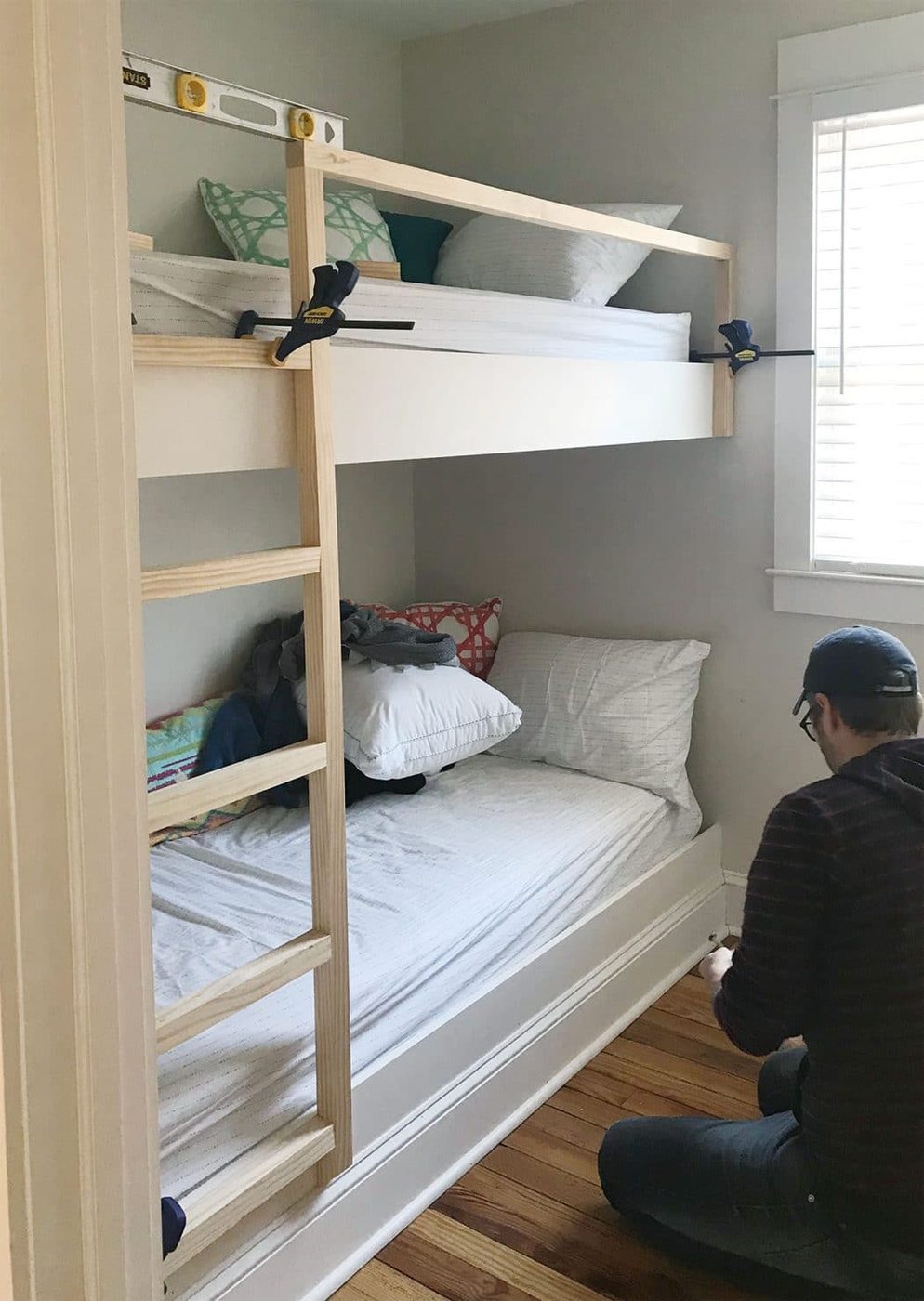 clamps holding hands-on bunk bed ladder and railings in place