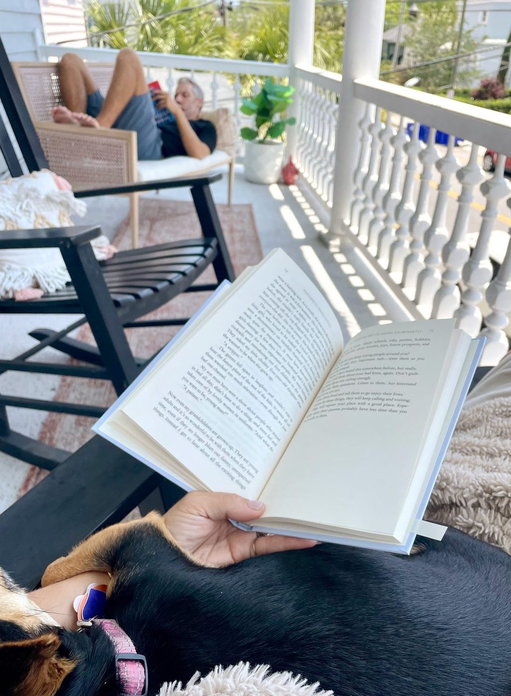 The house team Reading On Porch of Airbnb In Charleston South Carolina