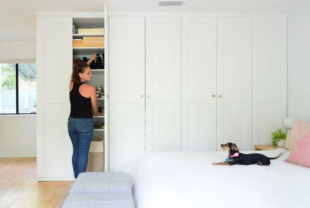 Sherry Opening Ikea Pax Wardrobe With Penny Chihuahua On Bed