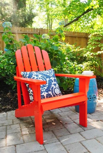 Adding Bright Red Adirondack Chairs To The Side Patio