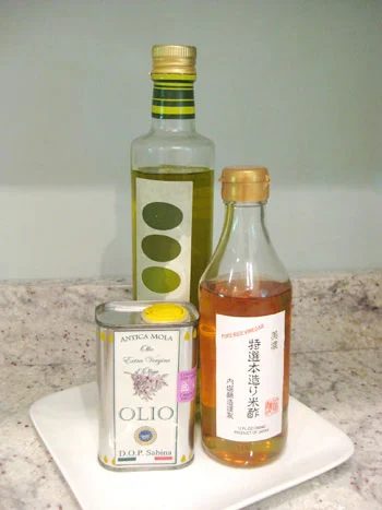 Grouping Olive Oil Bottles On A Platter: a house log