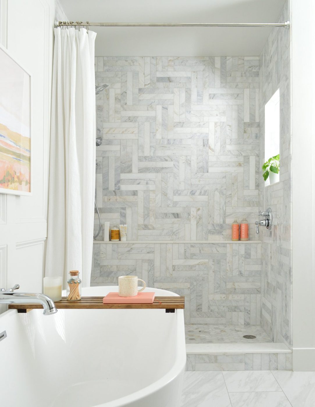 Walk In Shower Behind Freestanding Tub With Modern Herringbone Marble Tile Pattern